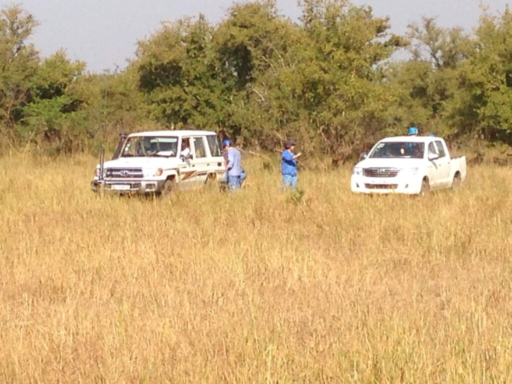 Work jeeps in field in Africa